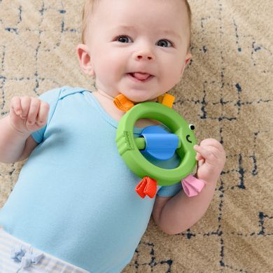 Брязкальце "Різнокольорові петельки" Fisher-Price (в ас.)